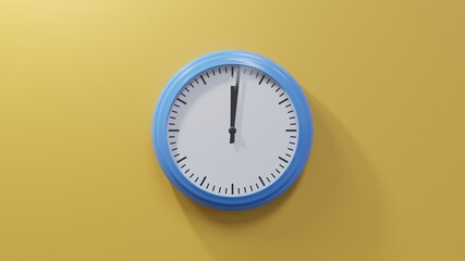 Glossy blue clock on a orange wall at one past twelve. Time is 00:01 or 12:01