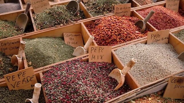 Wide variety of typical italian spices on a street market stall in Sicily, Italy
