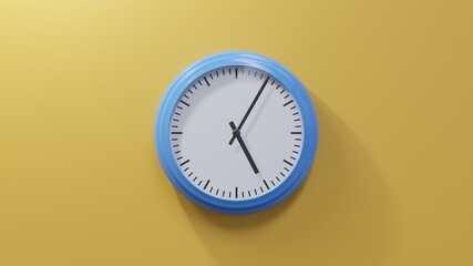 Glossy blue clock on a orange wall at five past five. Time is 05:05 or 17:05