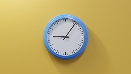 Glossy blue clock on a orange wall at six past nine. Time is 09:06 or 21:06
