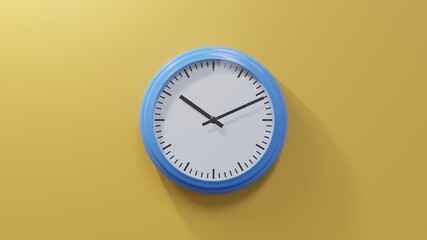 Glossy blue clock on a orange wall at eleven past ten. Time is 10:11 or 22:11