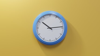 Glossy blue clock on a orange wall at fourteen past ten. Time is 10:14 or 22:14