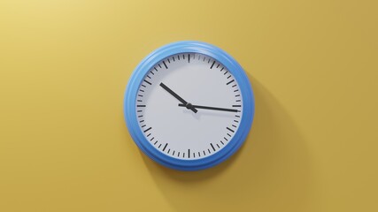 Glossy blue clock on a orange wall at sixteen past ten. Time is 10:16 or 22:16