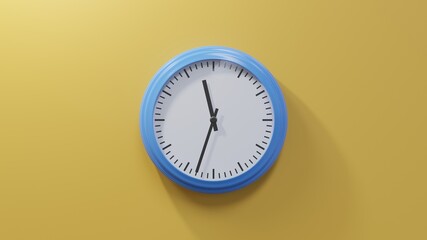 Glossy blue clock on a orange wall at thirty-three past eleven. Time is 11:33 or 23:33