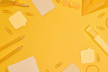 Minimalism, Back to school concept Yellow school supplies on yellow background, flat lay with copy...