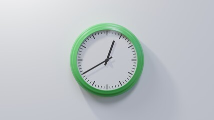 Glossy green clock on a white wall at twenty to one. Time is 00:40 or 12:40