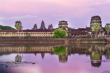 Fototapeta na wymiar Part of the Angkor wat temple reflecting in the lake by sunset in Siem Reap, Cambodia.