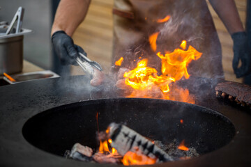 Sausage on Barbeque Smoker Grill. Hot and smoked sausage. Food Festival
