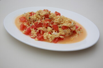 Close up of  Chinese one of most popular dish Fried eggs with tomatoes 