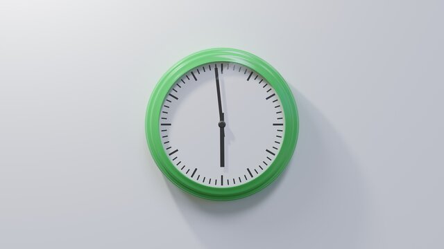 Glossy green clock on a white wall at fifty-nine past five. Time is 05:59 or 17:59