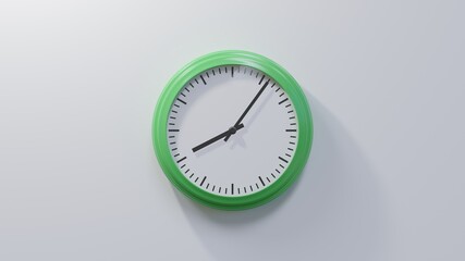 Glossy green clock on a white wall at six past eight. Time is 08:06 or 20:06