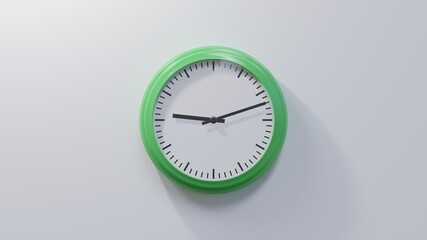 Glossy green clock on a white wall at twelve past nine. Time is 09:12 or 21:12