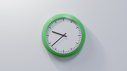 Glossy green clock on a white wall at thirty-eight past nine. Time is 09:38 or 21:38