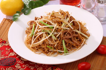 Close up of a typical Hong Kong and Cantonese style cuisine Soy sauce fried noodle with bean...