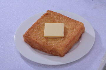 Close up of a typical Cantonese and Hong Kong bread Hong Kong style French Toast with butter