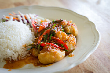 chicken fried in a spicy sauce and rice, Thai
