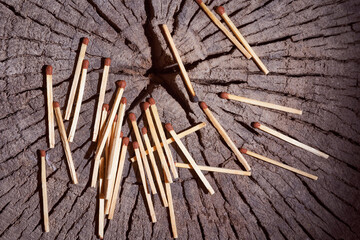 wooden matches lie on the wooden frame. Close-up.