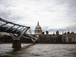 Fototapeta na wymiar Millenium bridge and St Paul Cathedral, London