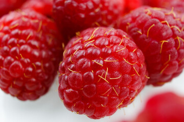 raspberries on white background