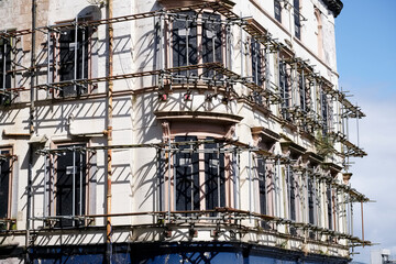 Scaffolding around hotel building construction site in progress