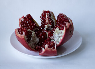 cut pomegranate in a plate
