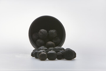 Dried lime shot on white background