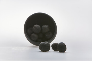 Dried lime shot on white background