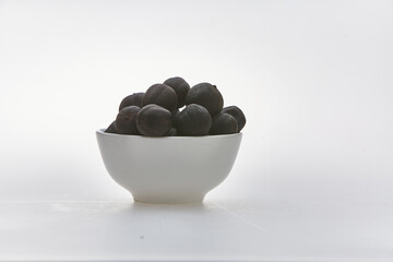 Dried lime shot on white background