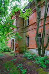 Naklejka premium Abandoned two-story brick school building in resettled village of Babchin in exclusion zone of Chernobyl nuclear power plant, Belarus