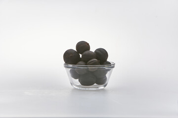 Dried lime shot on white background