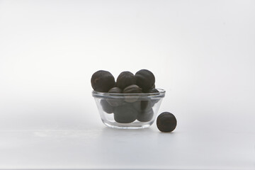 Dried lime shot on white background