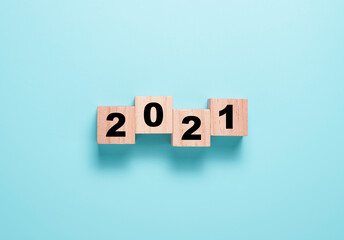Flipping wooden cubes block for change 2020 to 2021.  Happy new year to start new project and business concept.