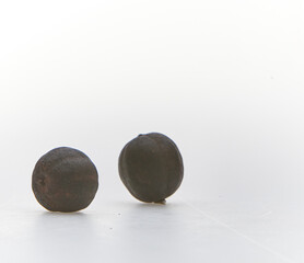 Dried lime shot on white background