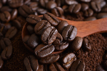 Close up,Coffee beans and ground (powder) coffee,Top view,Background.
