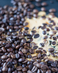 Background coffee beans with spiled coffee, close-up, selective focus