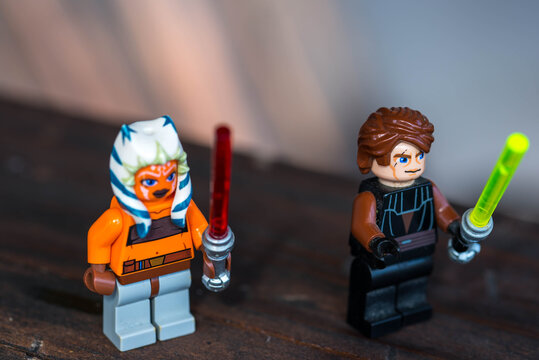 Miercurea Ciuc, Romania- 26 July 2020: Anakin Skywalker and Ashoka Tano Lego figurines holding the lightsabers.