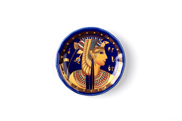 Plate with ancient egyptian god image. Isolated on white background.