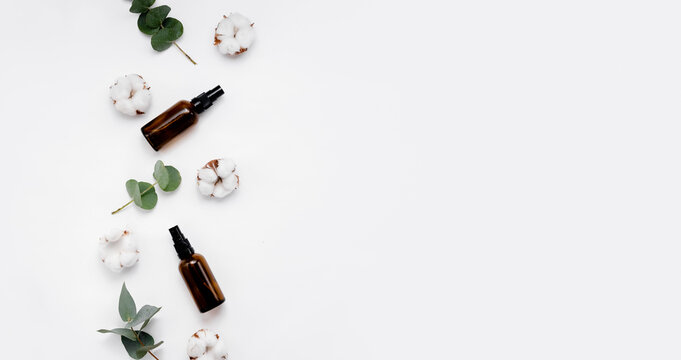 Skin care and mke up set. Hilauronic acid, lotion, serum and gel on abstract background. Top horizontal view