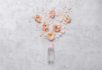 Fototapeta na wymiar Hand cream with flowers. Delicate skin care concept. Top horizontal view copyspace