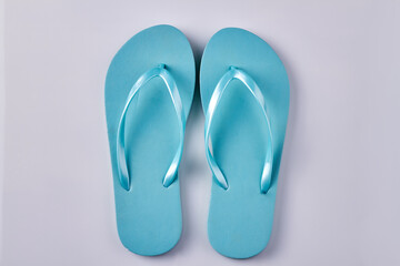 Pair of blue flip-flops. Isolated on white background.