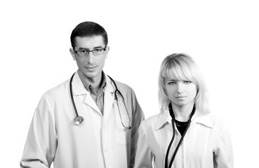 Man and woman in white coats of doctors with stethoscopes on a white background in isolation