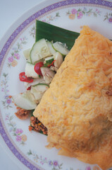 Vietnamese styled stuffed crispy egg crepe, local dessert made from many kinds of vegetable