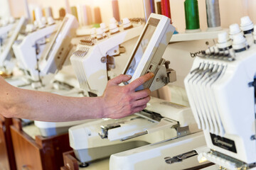 Fabric industry production line. Textile factory. Working tailoring process