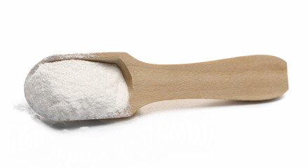 Sugar powder in wooden spoon isolated on white background