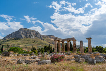 Temple of Apollo at Ancient Corinth with Acrocorinth castle at the background