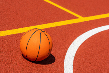 Basketball ball in the outdoors court