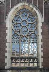 Obraz premium Beautiful architecture detail. Gothic style window. Ornamented rose window of a cathedral in gothic style. Lviv, Ukraine