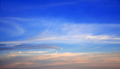 Naklejka na ściany i meble Beautiful blue sky in a sunny day with clouds. 