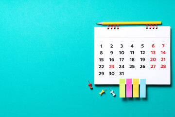 close up of calendar on the green table background, planning for business meeting or travel...