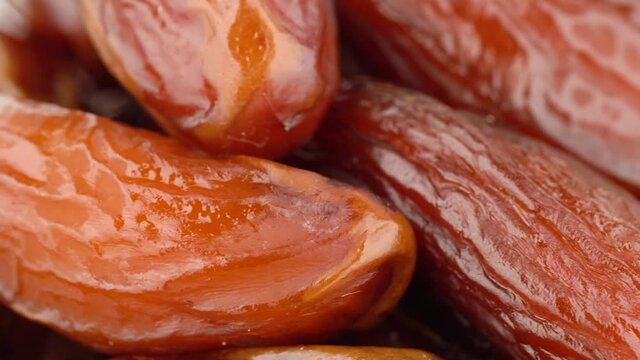 Ripe and fresh Date fruit rotation macro.